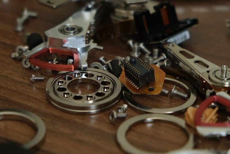 a table topped with lots of assorted metal objects